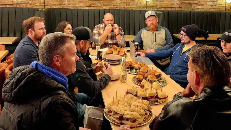 Frankfort Restaurant Association members around a table planning Restaurant Week 2025